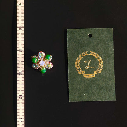 Celeste Bloom – Multicolor Crystal Flower Brooch | Radiant Contrast with Black Couture